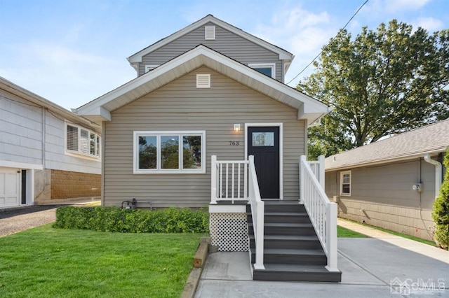763 Prospect Ave, Old Bridge, NJ 08879 - shotgun-style home with a front yard