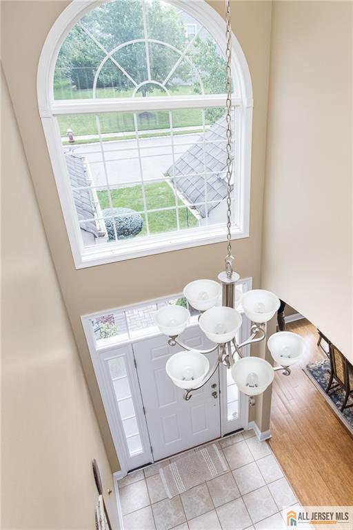 entryway featuring light tile patterned floors