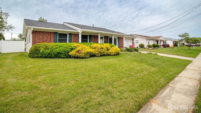 11 Drexel Ter, Monroe, NJ 08831 - ranch-style home with an attached garage and brick siding