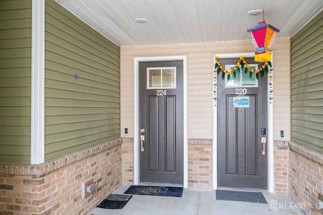 224 Park Ln, Dunellen, NJ 08812 - property entrance featuring brick siding