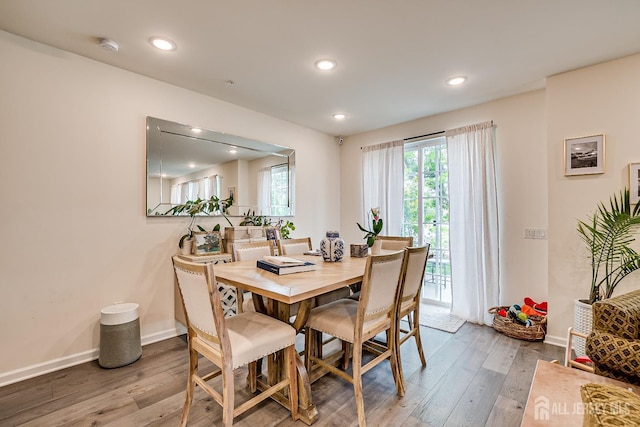 224 Park Ln, Dunellen, NJ 08812 - dining area featuring wood-type flooring, baseboards, and recessed lighting