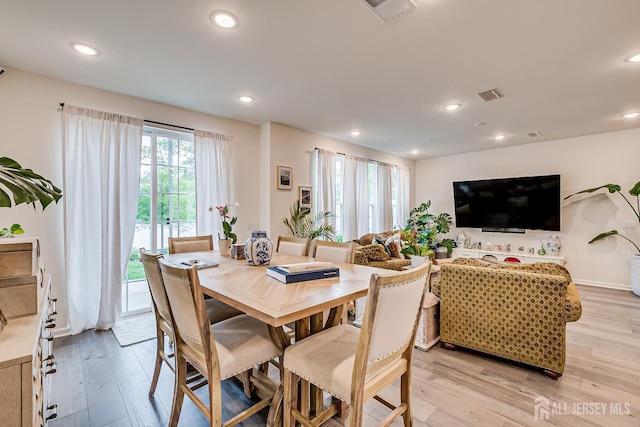 224 Park Ln, Dunellen, NJ 08812 - dining area with light wood-style flooring and recessed lighting