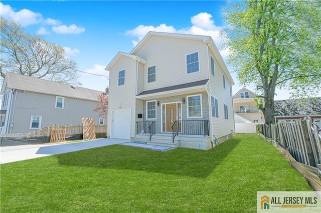 back of house with driveway and a garage