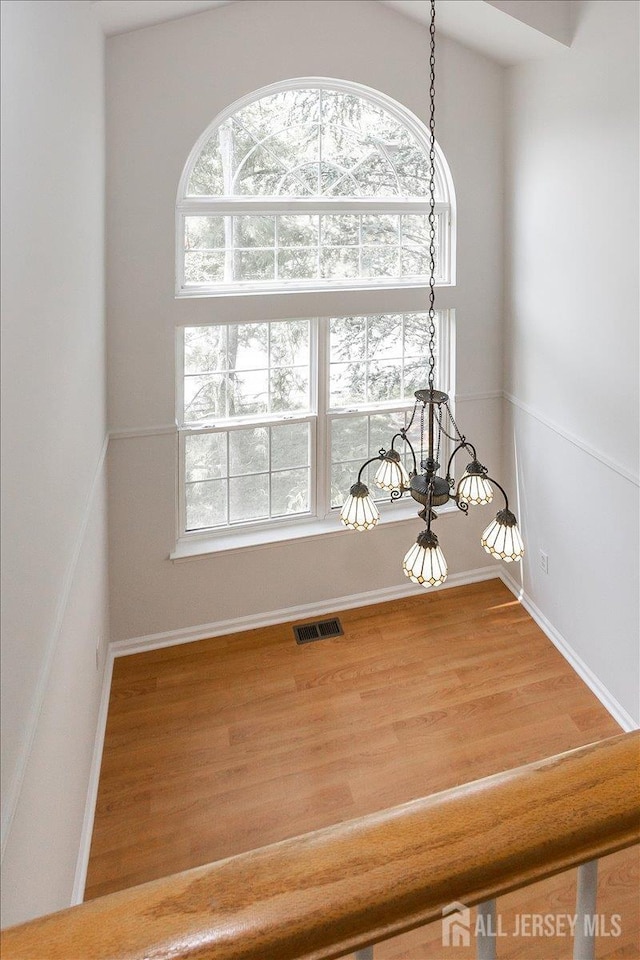 24 Hanna Ln, Old Bridge, NJ 08879 - detailed view of wood finished floors and baseboards