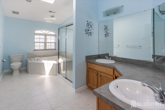 24 Hanna Ln, Old Bridge, NJ 08879 - bathroom with a garden tub, double vanity, a stall shower, tile patterned floors, and vaulted ceiling