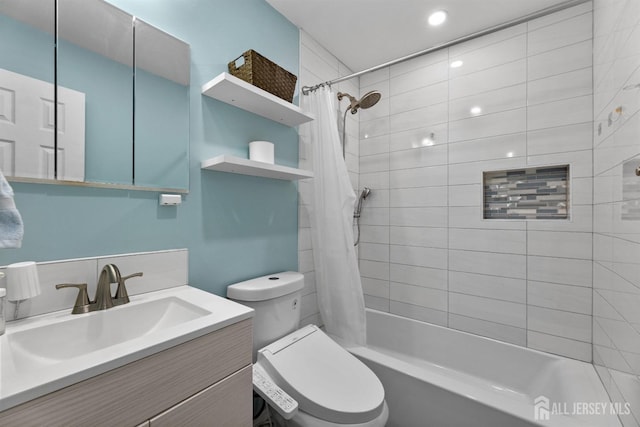 full bathroom with shower / tub combo, toilet, and vanity