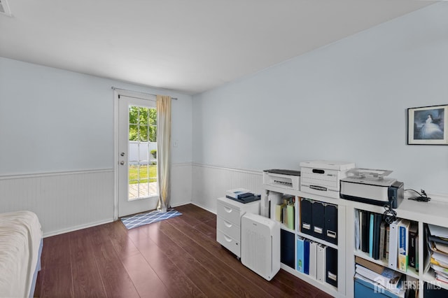 interior space featuring wainscoting and dark wood finished floors