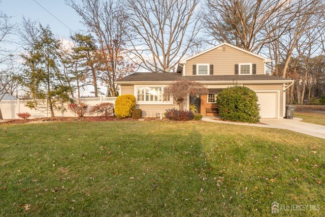 view of front of home with a front lawn