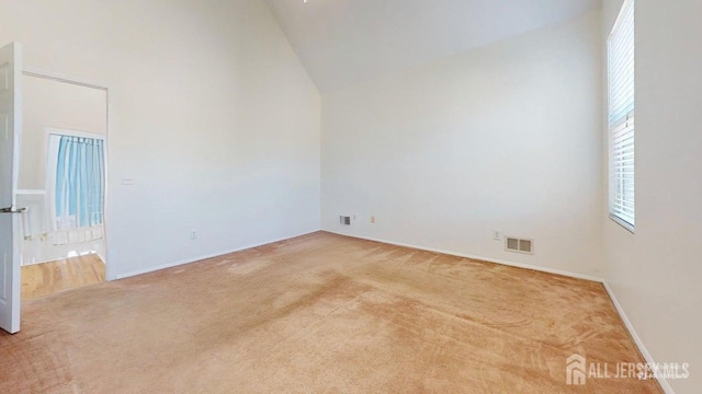 15-A Avenue B, Helmetta, NJ 08828 - carpeted spare room with high vaulted ceiling and baseboards