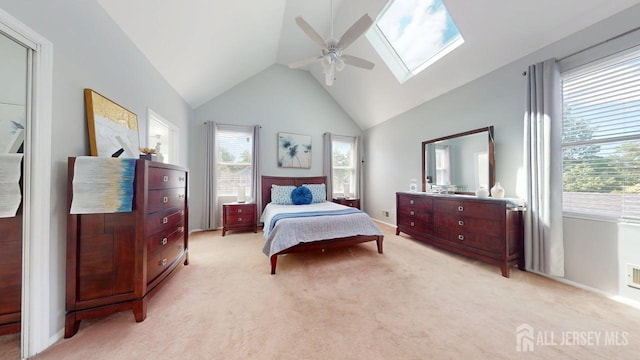 15-A Avenue B, Helmetta, NJ 08828 - bedroom with light colored carpet, lofted ceiling, multiple windows, a skylight, and ceiling fan