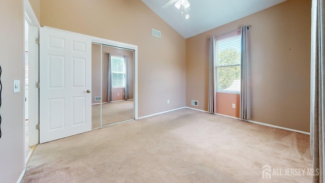 15-A Avenue B, Helmetta, NJ 08828 - unfurnished bedroom with carpet flooring, baseboards, a closet, high vaulted ceiling, and ceiling fan