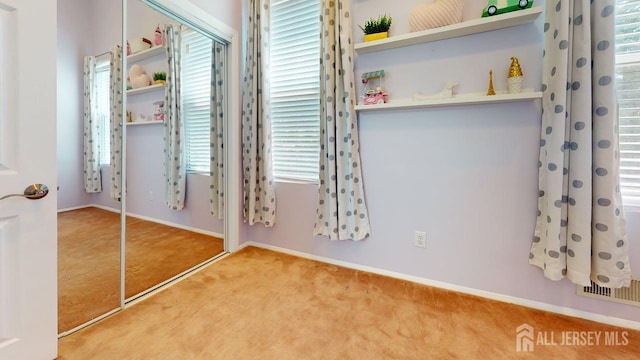 15-A Avenue B, Helmetta, NJ 08828 - unfurnished bedroom featuring carpet, baseboards, and a closet