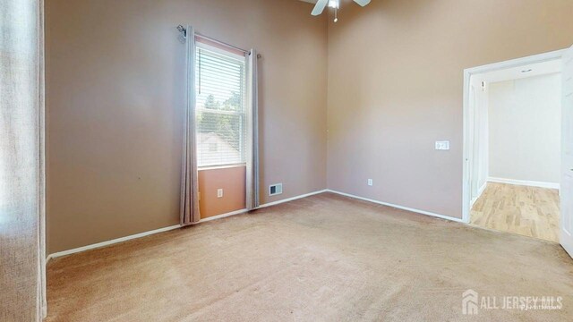 15-A Avenue B, Helmetta, NJ 08828 - carpeted empty room with ceiling fan and baseboards
