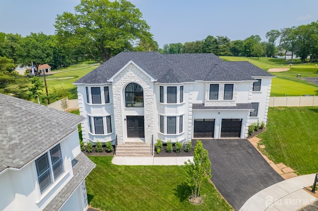 9 Links Dr, Edison, NJ 08820 - view of front of property with driveway, an attached garage, a front lawn, and a shingled roof
