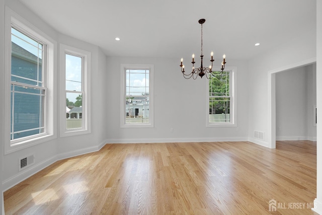 9 Links Dr, Edison, NJ 08820 - spare room with plenty of natural light, a chandelier, light wood-type flooring, and recessed lighting