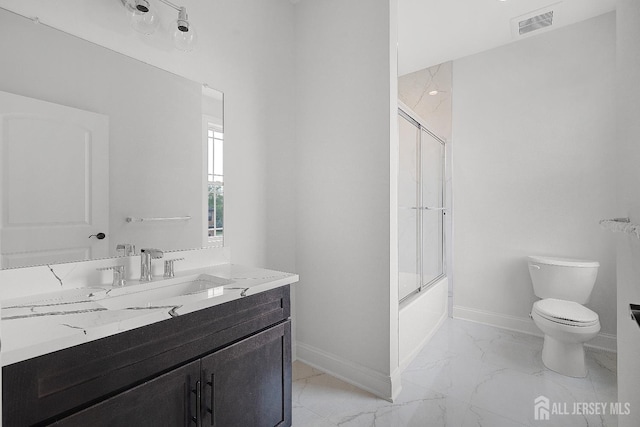 9 Links Dr, Edison, NJ 08820 - bathroom with marble look tile flooring, vanity, and enclosed tub / shower combo