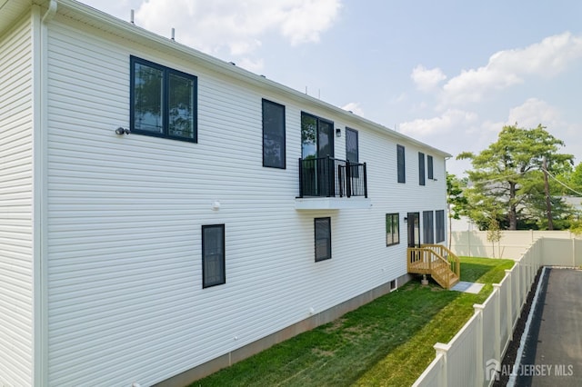 9 Links Dr, Edison, NJ 08820 - view of property exterior featuring a balcony and a fenced backyard