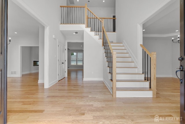 9 Links Dr, Edison, NJ 08820 - foyer entrance featuring stairs, wood finished floors, recessed lighting, and a chandelier