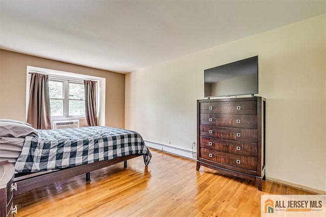 530 Andria Ave Unit 295, Hillsborough, NJ 08844 - bedroom with a baseboard heating unit, light wood-type flooring, and cooling unit