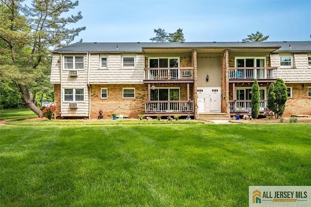 530 Andria Ave Unit 295, Hillsborough, NJ 08844 - rear view of property featuring a balcony, brick siding, and a yard