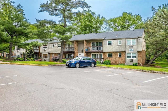 530 Andria Ave Unit 295, Hillsborough, NJ 08844 - view of building exterior featuring uncovered parking