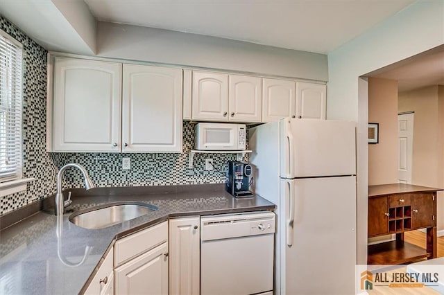 530 Andria Ave Unit 295, Hillsborough, NJ 08844 - kitchen with white appliances, white cabinetry, dark countertops, and backsplash