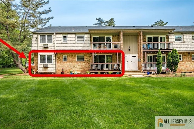 530 Andria Ave Unit 295, Hillsborough, NJ 08844 - view of front facade with brick siding, a front lawn, and a balcony