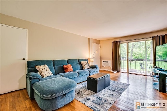 530 Andria Ave Unit 295, Hillsborough, NJ 08844 - living room with a wall mounted air conditioner and wood finished floors