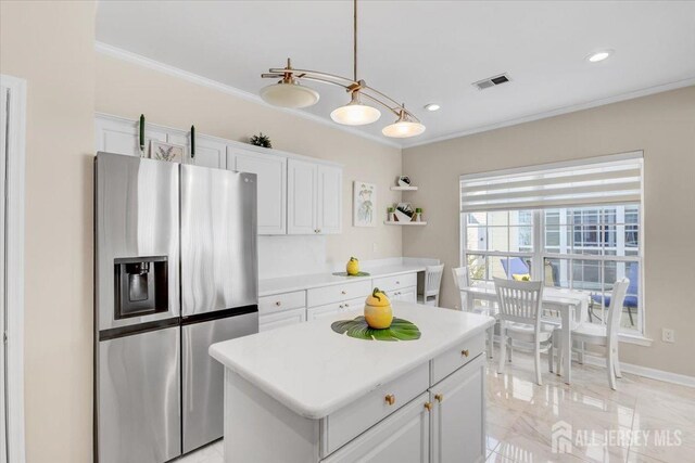 595 Waterside Blvd, Monroe, NJ 08831 - kitchen featuring stainless steel fridge, visible vents, light countertops, ornamental molding, and white cabinets