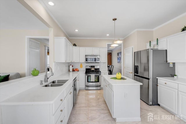 595 Waterside Blvd, Monroe, NJ 08831 - kitchen featuring a sink, marble finish floor, stainless steel appliances, light countertops, and white cabinetry