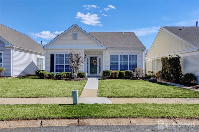 595 Waterside Blvd, Monroe, NJ 08831 - view of front facade featuring a front yard
