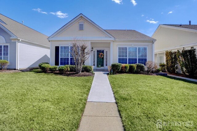 595 Waterside Blvd, Monroe, NJ 08831 - bungalow featuring a front yard
