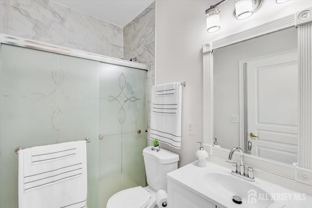 595 Waterside Blvd, Monroe, NJ 08831 - full bathroom featuring vanity, a shower stall, and toilet