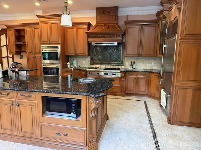 34 Line Rd, Holmdel, NJ 07733 - kitchen with stainless steel appliances, brown cabinetry, inlaid floor details, open shelves, and dark stone countertops