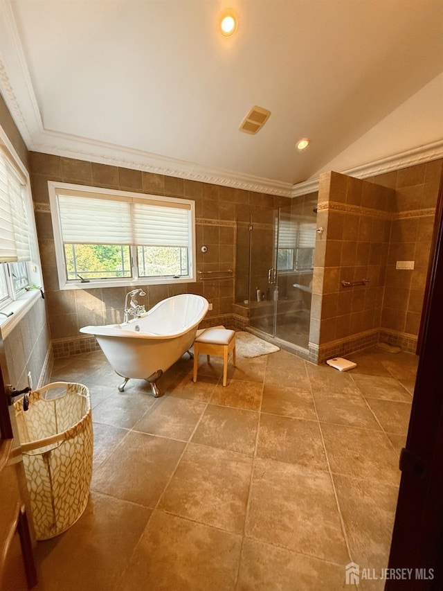 34 Line Rd, Holmdel, NJ 07733 - bathroom featuring tile walls, a freestanding tub, a stall shower, ornamental molding, and recessed lighting