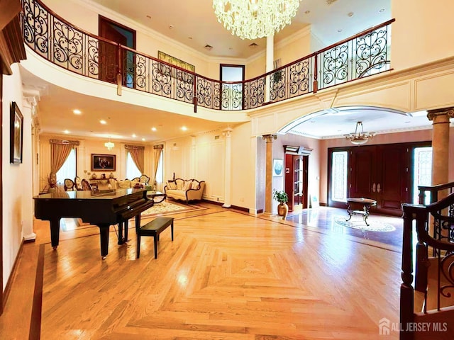 34 Line Rd, Holmdel, NJ 07733 - common area featuring ornamental molding and a towering ceiling