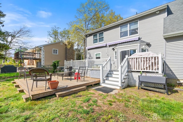 242 Green St, Old Bridge, NJ 08857 - back of house featuring a wooden deck