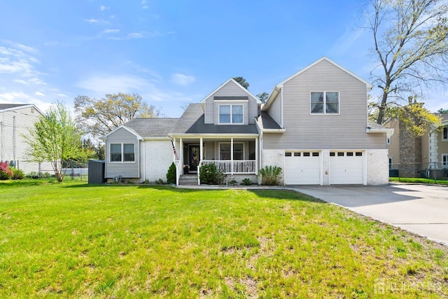 242 Green St, Old Bridge, NJ 08857 - traditional-style home with a porch, driveway, and an attached garage