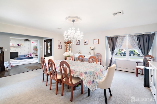 242 Green St, Old Bridge, NJ 08857 - dining room with a baseboard radiator, a chandelier, and light colored carpet