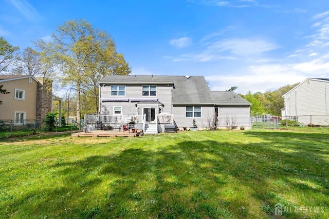 242 Green St, Old Bridge, NJ 08857 - back of property with a fenced backyard and a wooden deck