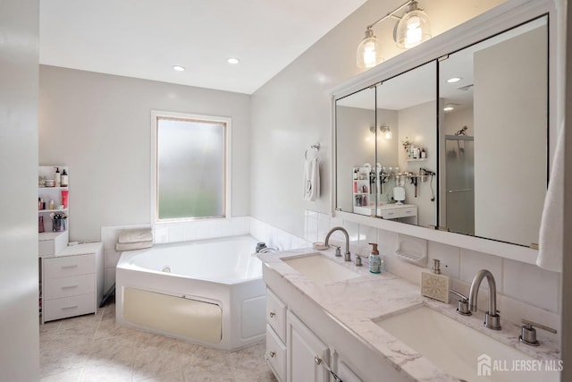 242 Green St, Old Bridge, NJ 08857 - bathroom featuring a whirlpool tub, double vanity, tile patterned floors, a shower with door, and recessed lighting