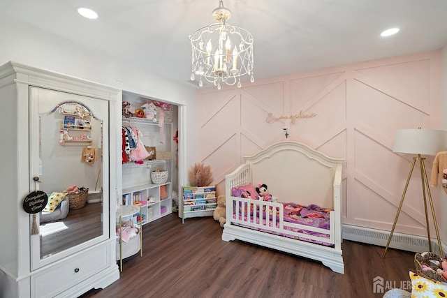 242 Green St, Old Bridge, NJ 08857 - bedroom featuring baseboard heating, a chandelier, dark wood-style floors, recessed lighting, and a closet