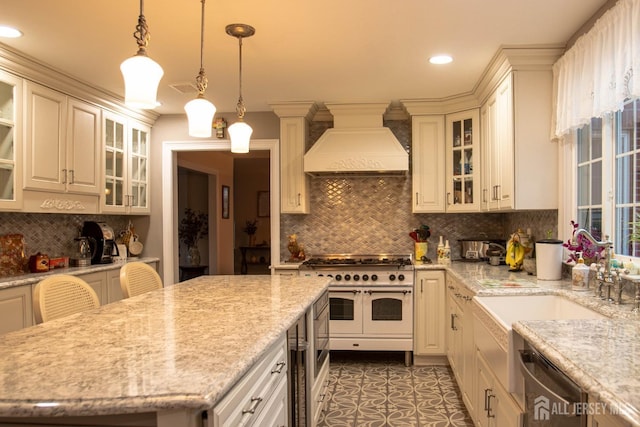 20 Wedgewood Ct, East Brunswick, NJ 08816 - kitchen featuring recessed lighting, stainless steel dishwasher, range with two ovens, premium range hood, and decorative backsplash