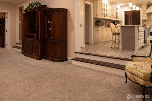 20 Wedgewood Ct, East Brunswick, NJ 08816 - living room featuring ornamental molding and light colored carpet