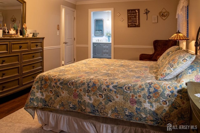 20 Wedgewood Ct, East Brunswick, NJ 08816 - bedroom featuring a sink, crown molding, ensuite bath, and wood finished floors