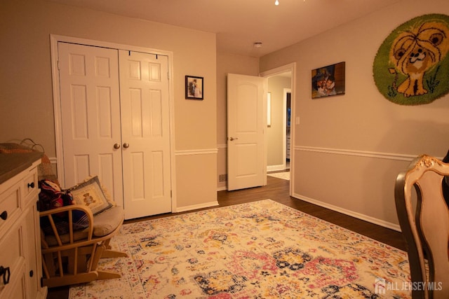20 Wedgewood Ct, East Brunswick, NJ 08816 - bedroom featuring baseboards, dark wood-type flooring, and a closet
