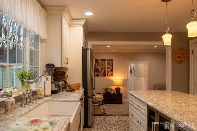 20 Wedgewood Ct, East Brunswick, NJ 08816 - kitchen featuring freestanding refrigerator, white cabinets, and a sink