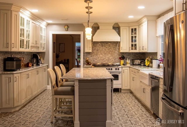 20 Wedgewood Ct, East Brunswick, NJ 08816 - kitchen with premium range hood, recessed lighting, backsplash, a center island, and appliances with stainless steel finishes