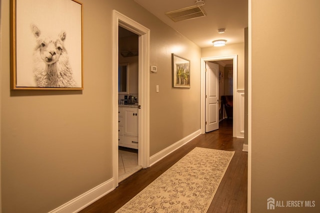 20 Wedgewood Ct, East Brunswick, NJ 08816 - hall featuring baseboards, visible vents, and dark wood-style floors