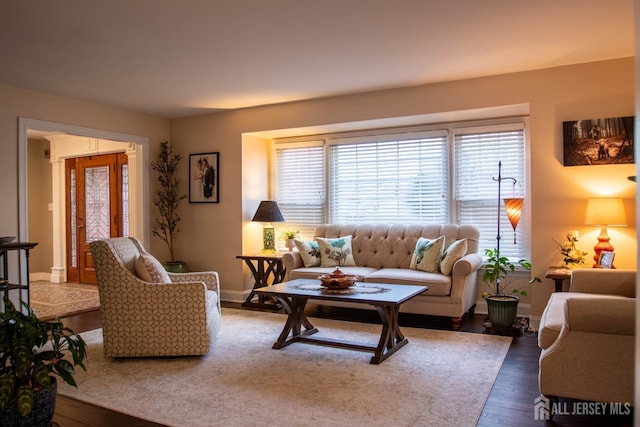20 Wedgewood Ct, East Brunswick, NJ 08816 - living area featuring baseboards and wood finished floors